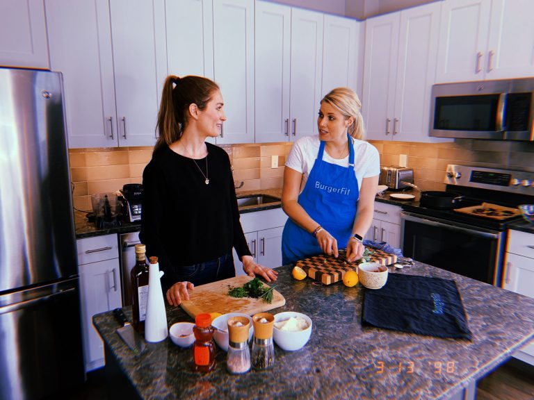 Alane Boyd and Megan Haley in Kitchen